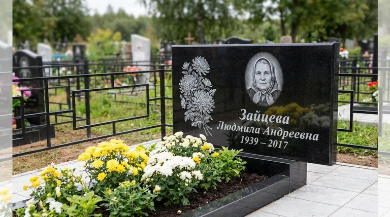 Памятник с гравировкой хризантем — выполненная работа «Зайцева» в Сургуте