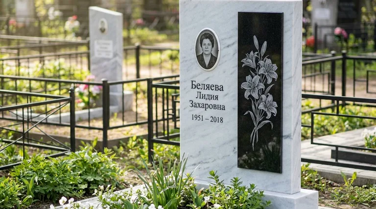 Памятник с гравировкой лилий — выполненная работа «Беляева» в Сургуте