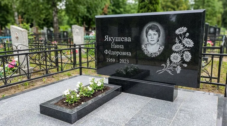 Памятник с гравировкой ромашек — выполненная работа «Якушева» в Сургуте
