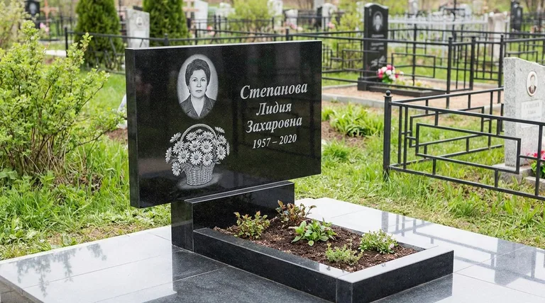 Памятник с гравировкой ромашек — выполненная работа «Степанова» в Сургуте