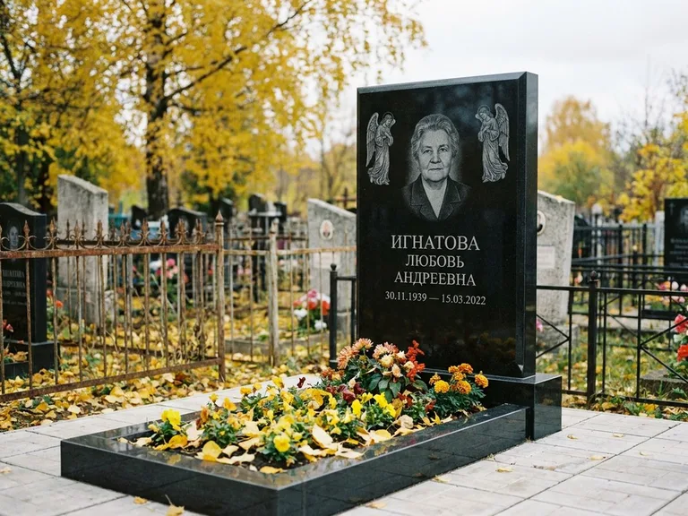 Памятник с гравировкой ангела — гравировка двух ангелов по сторонам портрета, работа «Игнатова» в Сургуте